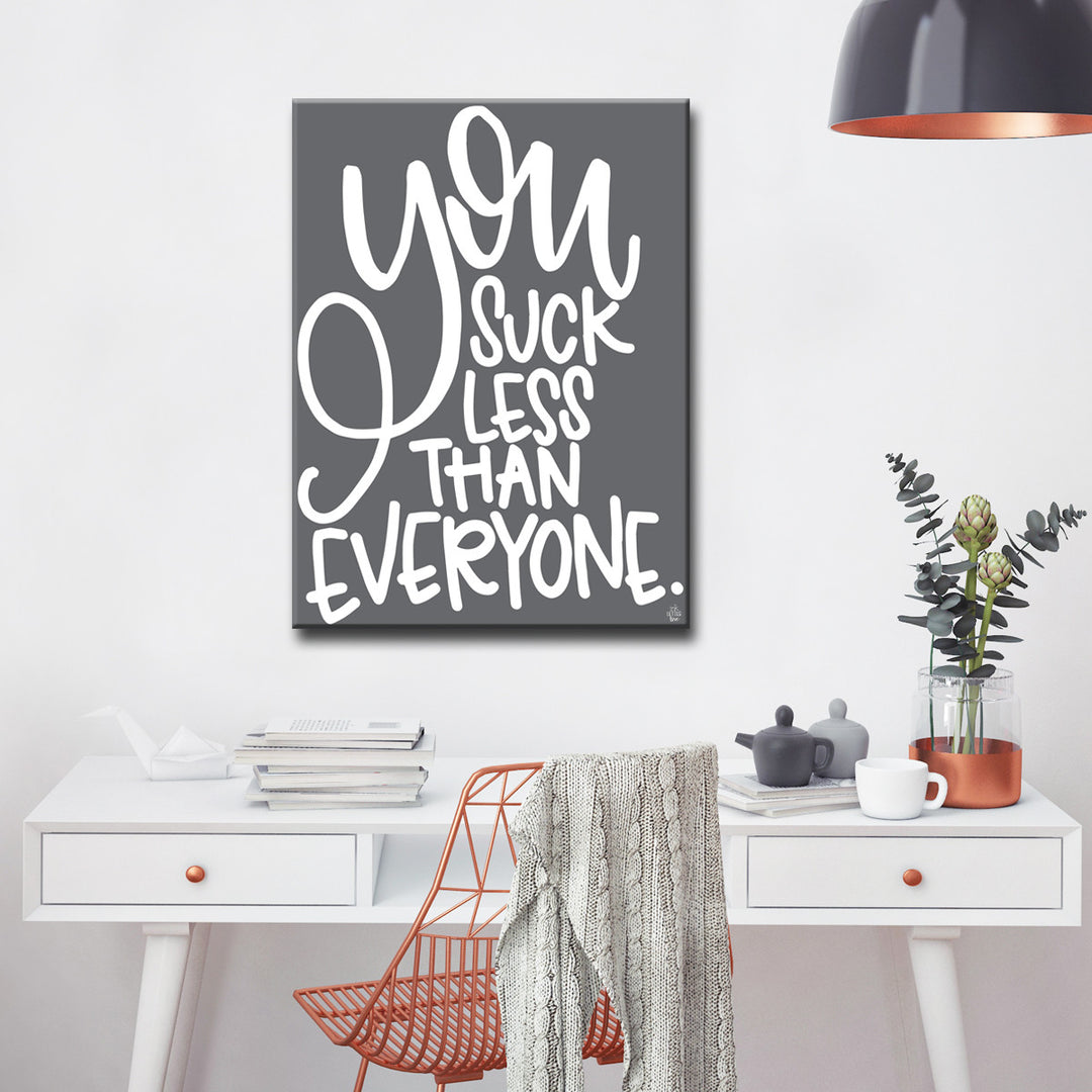 'You Suck Less' Wrapped Canvas Wall Art