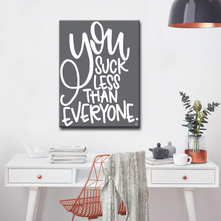'You Suck Less' Wrapped Canvas Wall Art